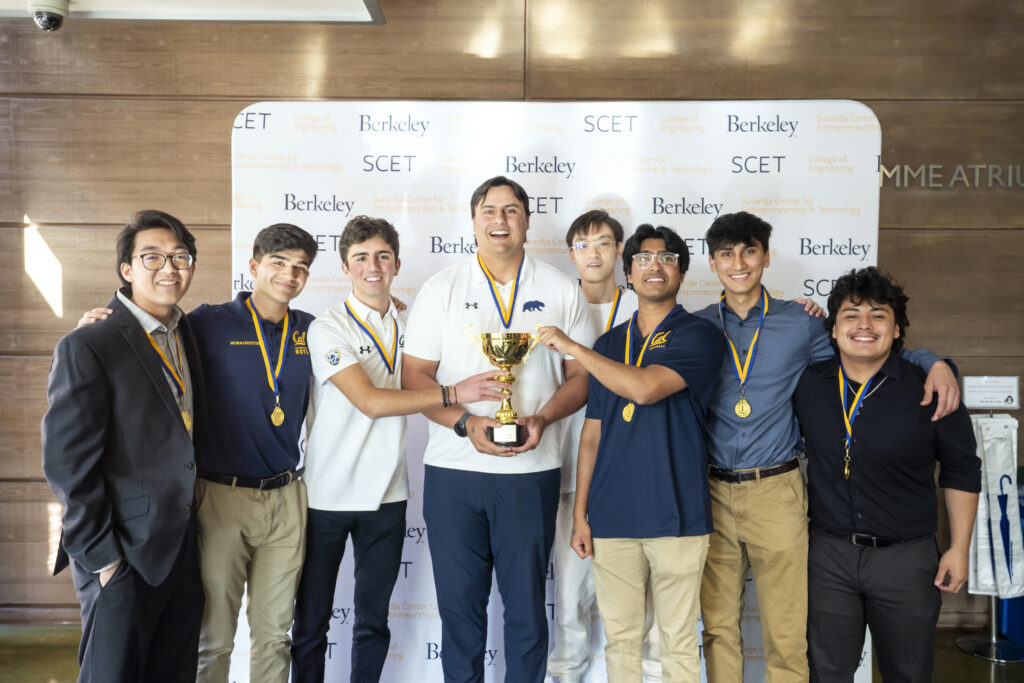 Team Playvision posing with Collider Cup trophy