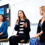 Speakers on the panel discuss "Tracking War Crimes in the AI Era." From left to right: Gigi Wang, Oleksandra Matviichuk and Alexa Koenig