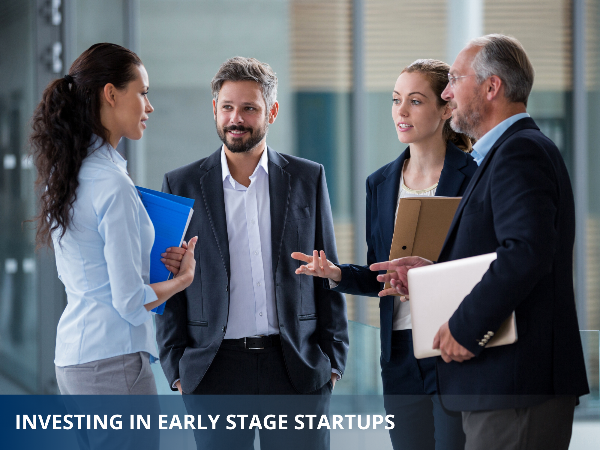 Text with "Investing in Early Stage Startups" on a blue gradient on a background image featuring 4 executive students for Venture Capital for Tech program at UC Berkeley Sutardja Center for Entrepreneurship & Technology
