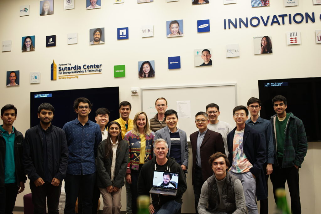 Global Program Director and judges (center) with the winning teams at the Pitch Contest