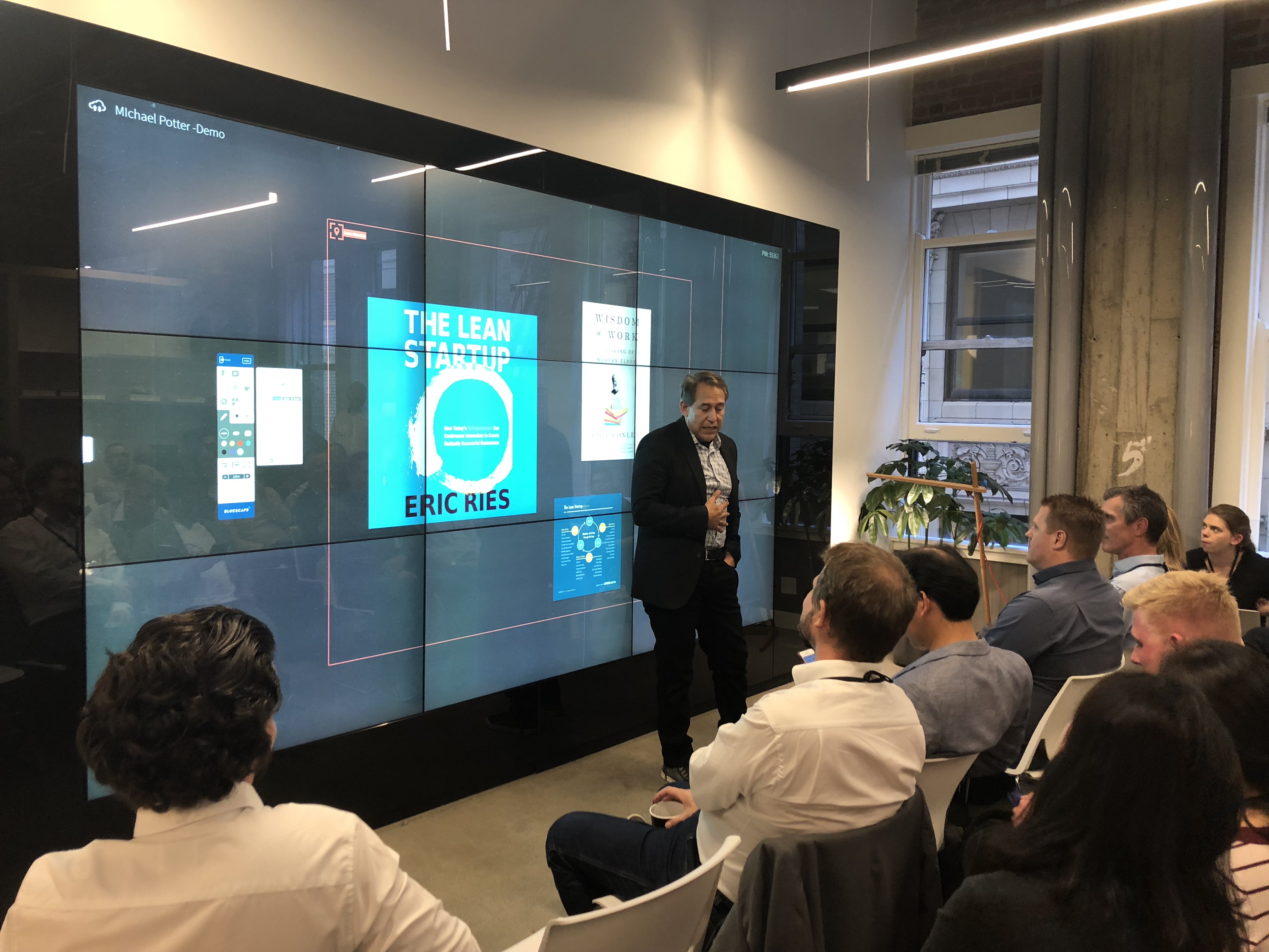 Rick Tywoniak, Chief Marketing Officer at Bluescape and Cal alumnus, presents to executives attending Silicon Valley Innovation Leadership week.